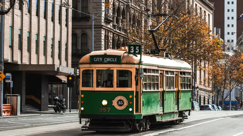 A green City Circle heritage tram on a Melbourne street